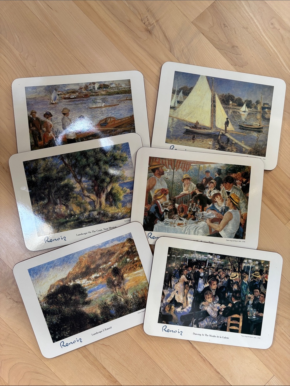 Set of six cork Renoir art placemats